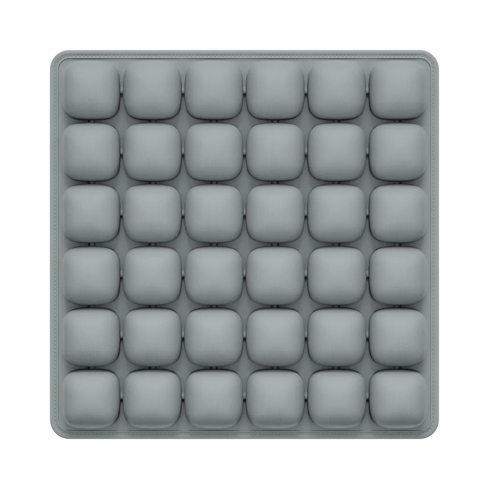 OORiver Adjustable Press-to-Inflate Seat Cushion in Grey — top view of the 36 air-cell grid